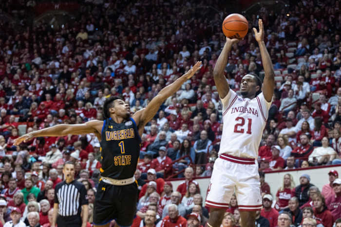 Indiana Hoosiers forward Mackenzie Mgbako (21) shoots the ball while Morehead State Eagles guard Jerone Morton (1) defends at Simon Skjodt Assembly Hall.